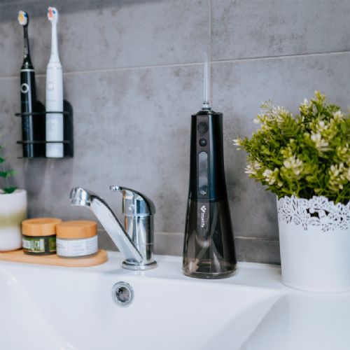 Električni zubni irigator TrueLife Compact L100 crni